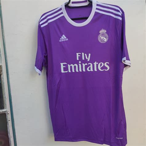 purple fly emirates jersey.